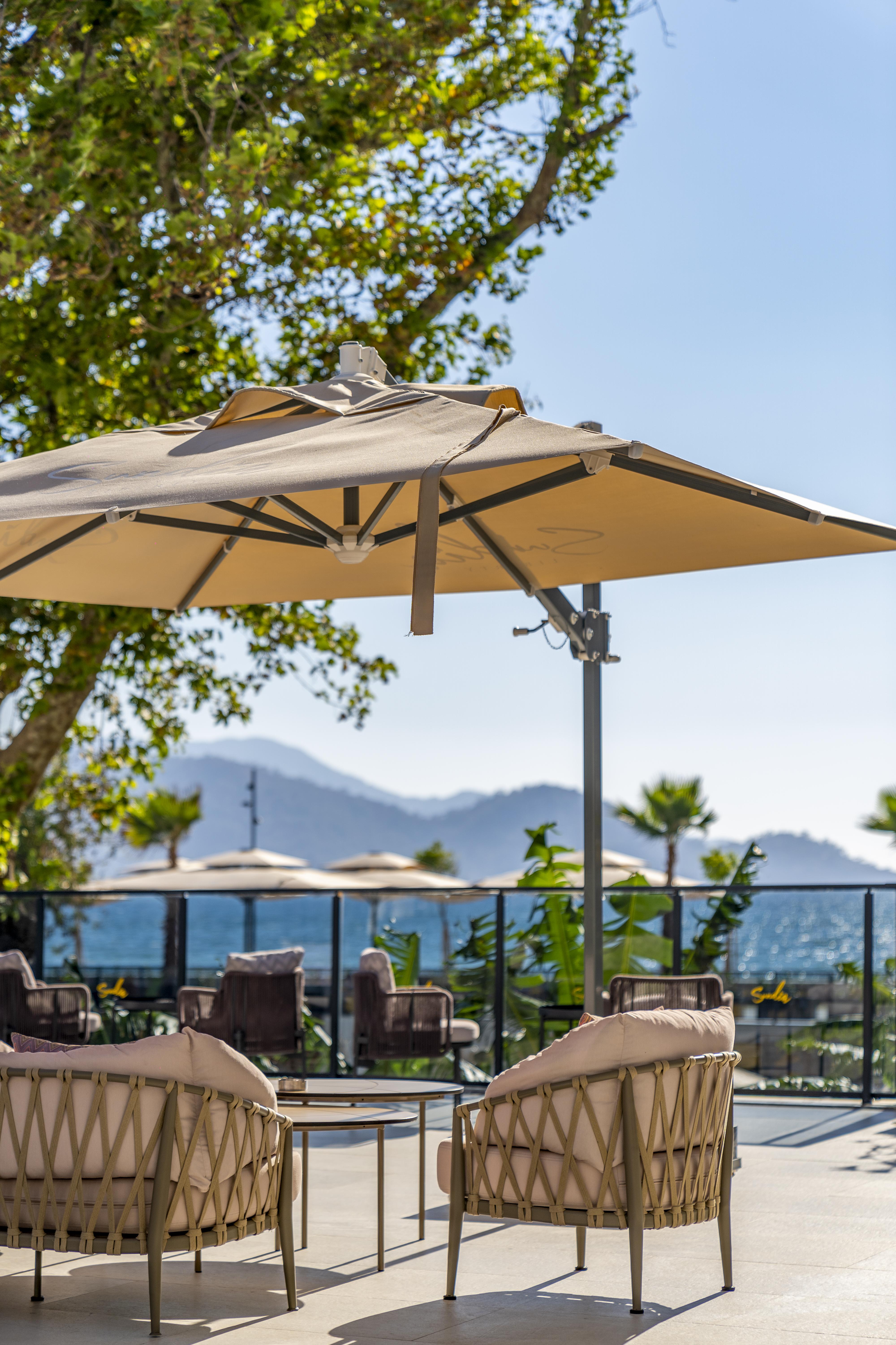 Sundia Exclusive By Liberty Fethiye Adults Only Hotel Exterior photo A cantilever umbrella